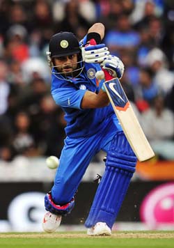 Virat Kohli plays a shot in his 100th ODI
