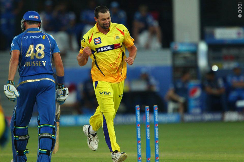 A dejected Mike Hussey walks back to the pavilion