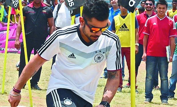 Kohli playing football